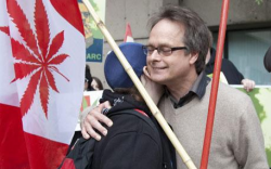 Marc Emery saying farewell to his friends before being hauled away to an American prison.